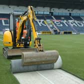 Work to replace the current surface, which was put down in 2013, at the Falkirk Stadium has now been started by Grangemouth firm Sportex Group (Pictures: Michael Gillen)