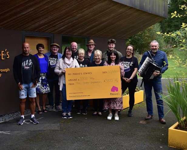 The organisers of the special Denny Daymakers tribute gig present a cheque for £3333 to Maggie's Forth Valley