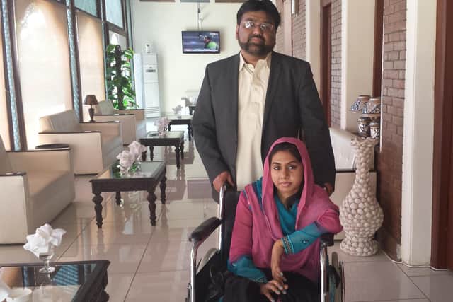 Farah Javed with her uncle Rev. Aftab Gohar in Pakistan in April 2014. She was left paralysed after a terrorist bombing in Peshawar the year before. Pic: Contributed