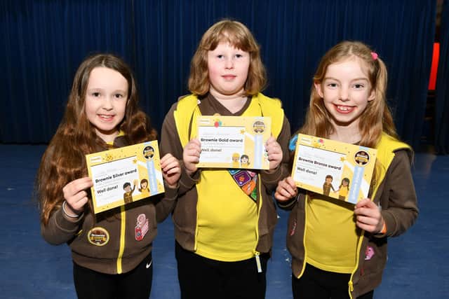 Pictured with award certificates Isla Nelson, Brownie Silver award, Eleanor Morrison, Brownie Gold award and Rosie Feeney, Brownie Bronze awards.  (Pic: Michael Gillen)
