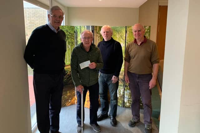 Kirkliston Community Council present a cheque to Jim Snodgrass and John Robson at The Haven