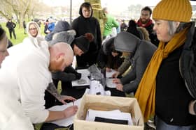 People queuing up to sign petition against closure of Bo'ness Recreation Centre. Pic: Alan Murray