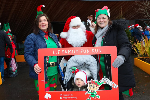 Moira and Janice with 18-month-old Tommy and Santa.