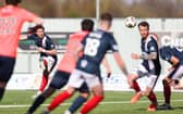 Falkirk's Ethan Ross (L) scores to make it 4-0 (Photo by Roddy Scott / SNS Group)