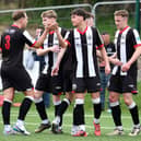 Kai Wilson celebrates his strike against Edinburgh Uni with his Dunipace team-mates (Photo: Michael Gillen)