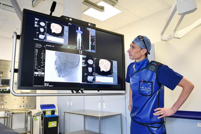 Dr Nik Arestis, clinical lead radiology and consultant interventional radiologist, views the imaging from the new machines. Pic: Michael Gillen