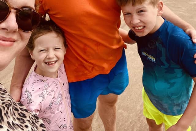 Brody McAteer, 10, with his dad Gordon McAteer, mum Laura Rutherford and sister Sydney, 7.