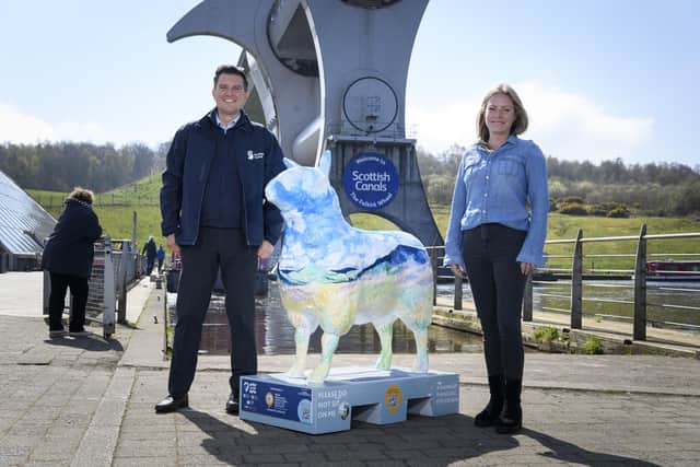 Ross Fraser and Claire Morgan, from Scottish Canals, with 'Clova' at the Falkirk Wheel.   (Pic: Ian Georgeson)