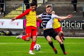 East Stirlingshire ace Tony Coutts, who came off injured, looks to tackle Albion Rovers' Conor Scullion during Saturday's 2-2 Lowland League draw (Photo: Ciaran Reid)
