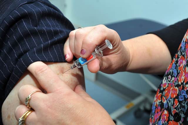 People are being encouraged to get Covid boosters and flu vaccine