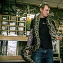Racks 4 Reptiles owner George Struthers with Larry the Burmese python