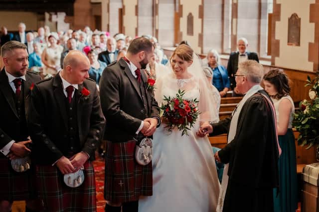 Elise Thomson and Thomas Peden who were married on June 11, 2022 in Stenhouse and Carron Church by the bride's father, Rev. Bill Thomson.