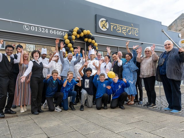 Rasoie team and guests celebrate one year anniversary.