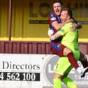 Stenny goalkeeper Darren Jamieson celebrates with Ross Meechan after shootout win (Pic Michael Gillen)
