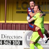 Stenny goalkeeper Darren Jamieson celebrates with Ross Meechan after shootout win (Pic Michael Gillen)