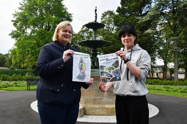 Re-opening day: Councillor Cecil Meiklejohn, Falkirk Council leader, and Allana Hughes, Zetland Park regeneration project manager with leaflets for the event. Pics: Michael Gillen