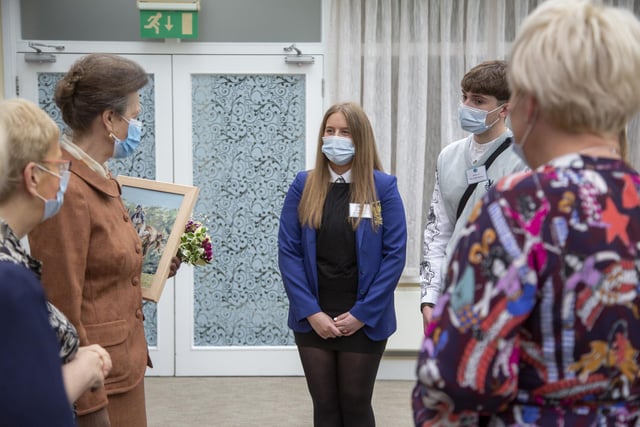 The Princess Royal learns more about the fashion show organised by Larbert High pupil. Pic: Ian McDiarmid