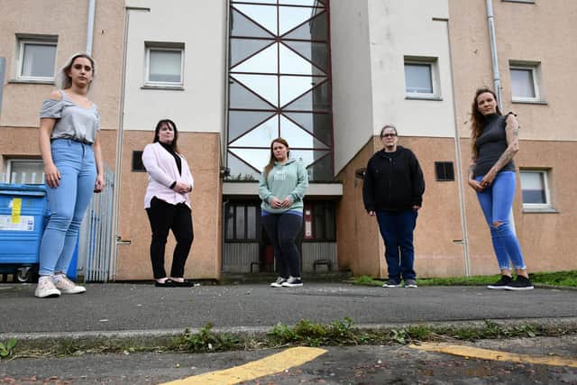 Residents of numbers one to 12 Islay Court, Grangemouth - Steph Stewart, Laura McGuckin, Samantha Anderson, Sharon Kennedy and Bernadette McGuckin -  prepare to do battle against the cockroaches infesting their block