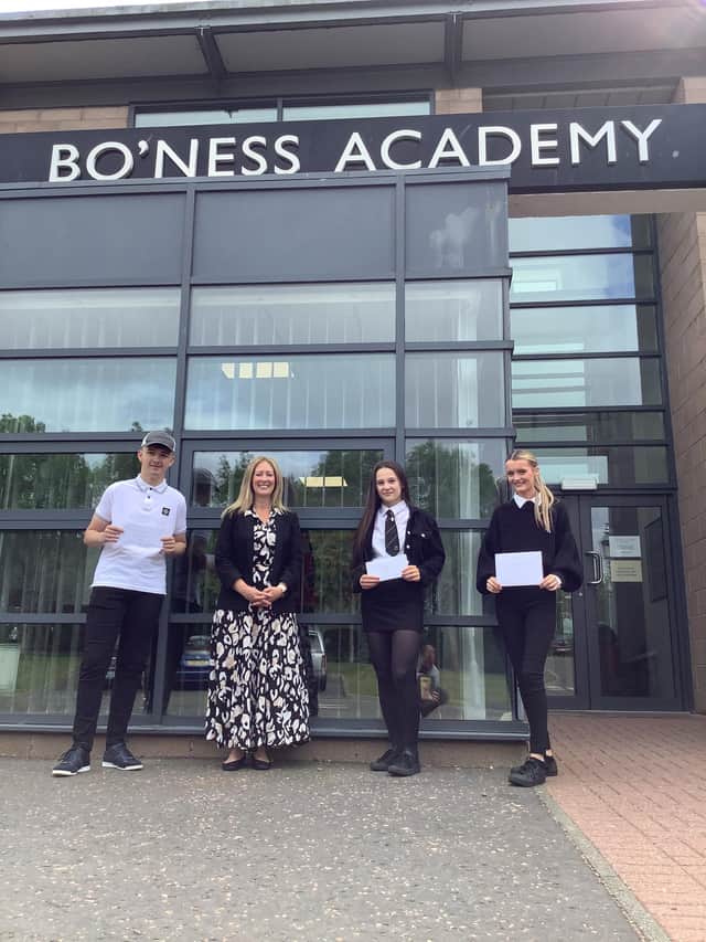 Pupils David Hogg, Niamh Alldred and Naomi Meikle, with Boness Academy headteacher Catriona Reid.
