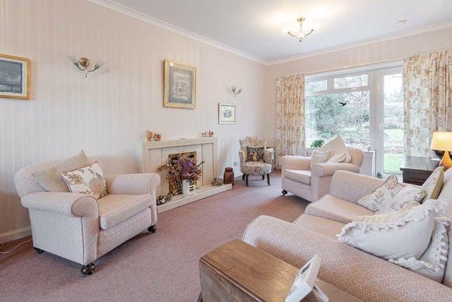 The living room is flooded with natural light thanks to its dual aspect.