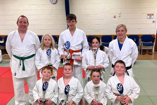 Coach Jayne Clason and assistant coach Alistair Stewart with the Deanburn youngsters who enjoyed success down in North Shields