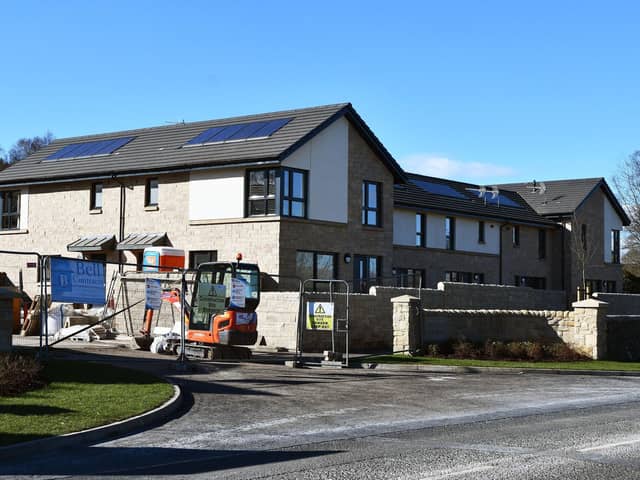 The 24 properties were due to be completed January 2022 but workmen are still on the site