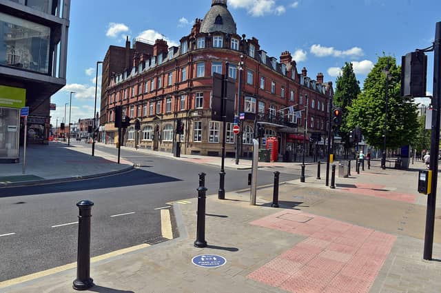 Doncaster town centre is being marked out with for social distancing signs. Note the Keep Your Distance sign