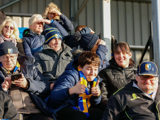 Mansfield Town fans at The Dunes Hotel Stadium for the match against Barrow.