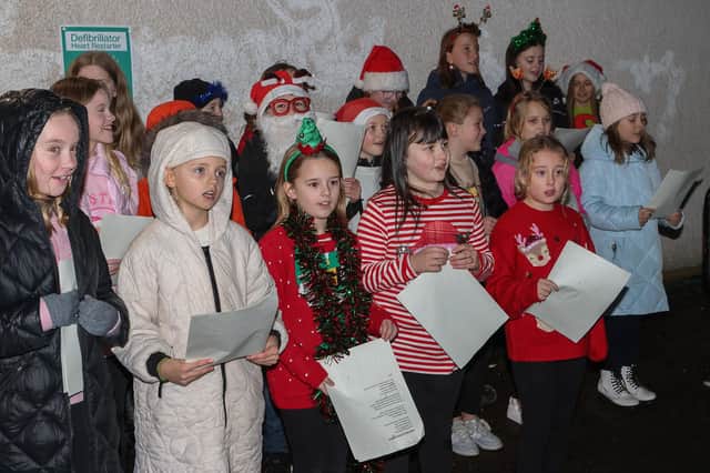 Youngsters from the primary school entertained those attending Airth's Christmas light switch on on Friday.  (Pic: Scott Louden)
