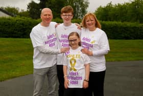 Ashlee (13 with dad Donald, mum Lisa and brother Jayden (15) taking part in last year's Braes High Schooll Family Walk to raise money for her appeal fund