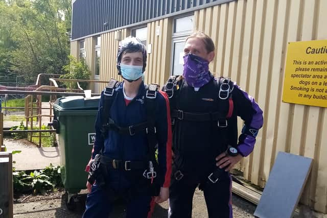 Carrondale Care Home chef Nikos Kokkoris (left) completed a skydive over Fife Airport to help fund a wheelchair-adapted minibus for the facility. Contributed.