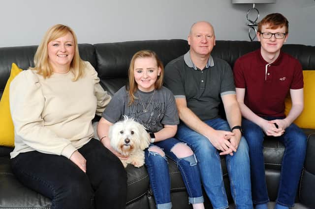 Brightons girl Ashlee Easton with mum Lisa, dog Angel, dad Donald and brother Jayden. Picture: Michael Gillen.