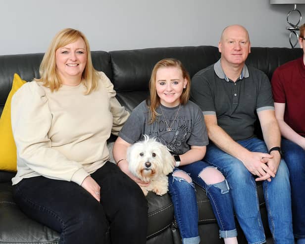 Brightons girl Ashlee Easton with mum Lisa, dog Angel, dad Donald and brother Jayden. Picture: Michael Gillen.