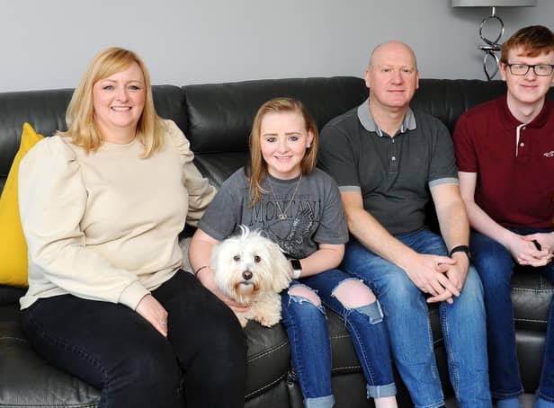 Brightons girl Ashlee Easton with mum Lisa, dog Angel, dad Donald and brother Jayden. Picture: Michael Gillen.