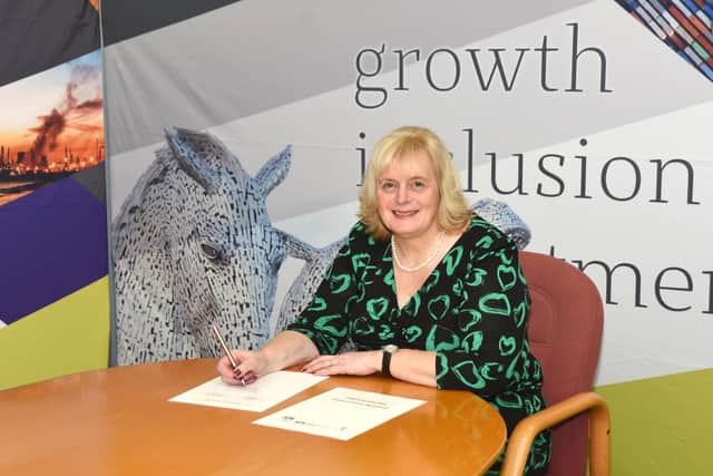 Cecil Meiklejohn, leader of Falkirk Council, signs the growth deal