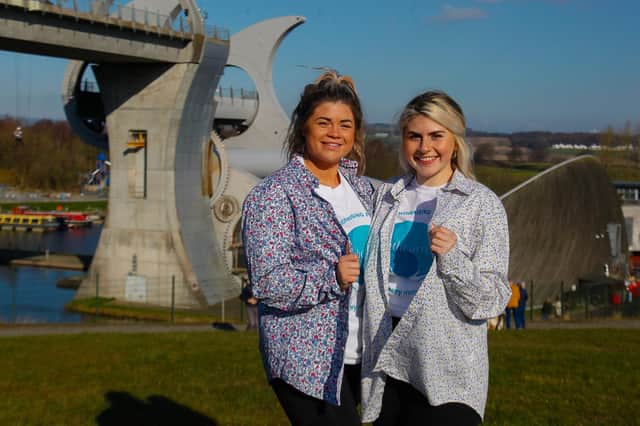 Rhianne and Jennifer Brisbane from Larbert took part in the Strathcarron Hospice charity abseil at the Falkirk Wheel wearing their late father Alan's shirts.