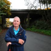 Denny resident Gordon Jack is pleased action is being taken to keep youths away from a danger spot on the M80. Picture: Michael Gillen.