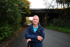 Denny resident Gordon Jack is pleased action is being taken to keep youths away from a danger spot on the M80. Picture: Michael Gillen.