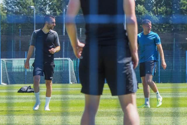 Ben Close and Bryn Morris involved in training at Pompey's training base in Hilsea.  Picture: Habibur Rahman