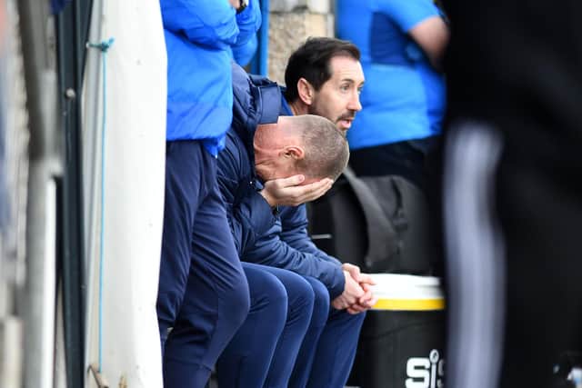 Frustration shown from assistant coach Kenny Miller and head coach Martin Rennie on the bench (Pictures: Michael Gillen)