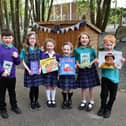 Some of the Reading Reps at the new Reading Garden and Shed in the grounds of Kinnaird Primary School. Pic: Michael Gillen