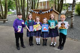 Some of the Reading Reps at the new Reading Garden and Shed in the grounds of Kinnaird Primary School. Pic: Michael Gillen