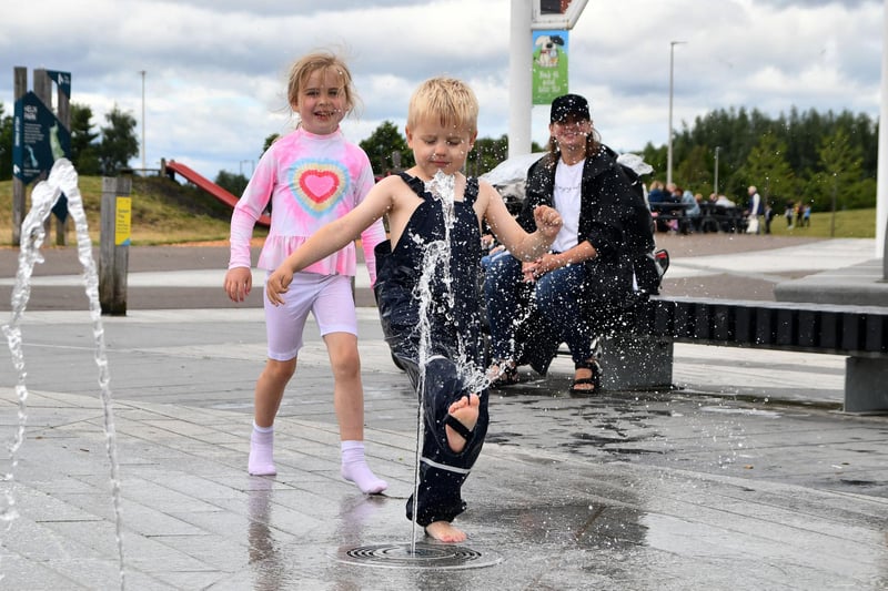 The safest kind of water -  Blaire Mackenzie, 6, and Angus Mackenzie, 4, from Wallacestone