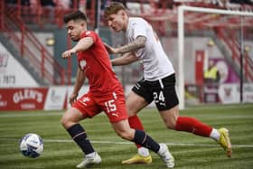 Leon McCann goes up against Clyde's Cameron Salkeld (Pics by Alan Murray)