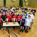 Competitors in the recent Falkirk & District Battalion of the Boys' Brigade basketball competition at Grangemouth High School. Also present was Gillian Thomson, secretary of Falkirk Fury, who sponsored the event and donated the trophies.