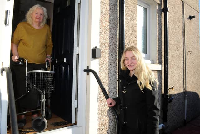 Patricia Stewart (72) meets her saviour Hermes delivery worker Karolina Domska (22) who was there to help her when she fell in the snow and was abandoned  by a nasty postman
