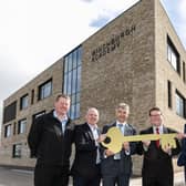 David Wright from Morrison Construction, John Hamilton from Winchburgh Developments Ltd and Scott Brown from Hub South East officially hand over the building to West Lothian Council’s Executive councillor for Education, Andrew McGuire and Leader of West Lothian Council, Lawrence Fitzpatrick.