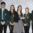 Teacher Heather Anderson and pupils from St Mungo's High School receive award from the Scottish Fire & Rescue Service. Pic: Contributed