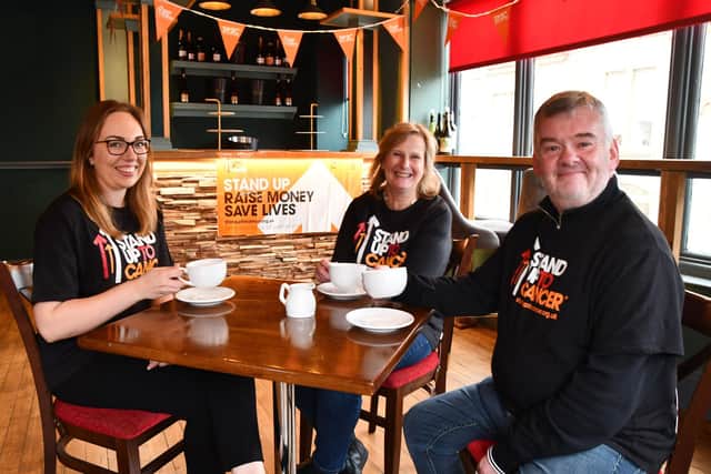 Pictured: Louise Young, events coordinator Wine Library; Angela Brown, owner Wine Library and David Cumming, manager CRUK Falkirk. Pic: Michael Gillen