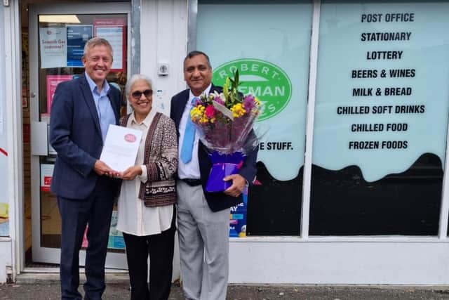 Retiral presentation to Maidenpark Postmistress Iffat Rahim and her husband Fiaz. They are pictured with Post Office Area Manager, Brian Mcnaughton,
